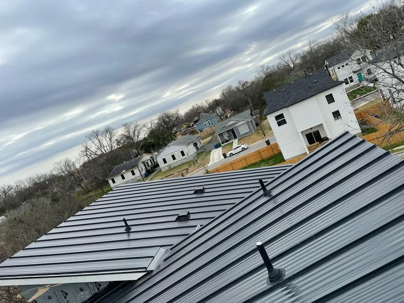 Standing seam metal roof panels with vents for Skylight Repair in University Park